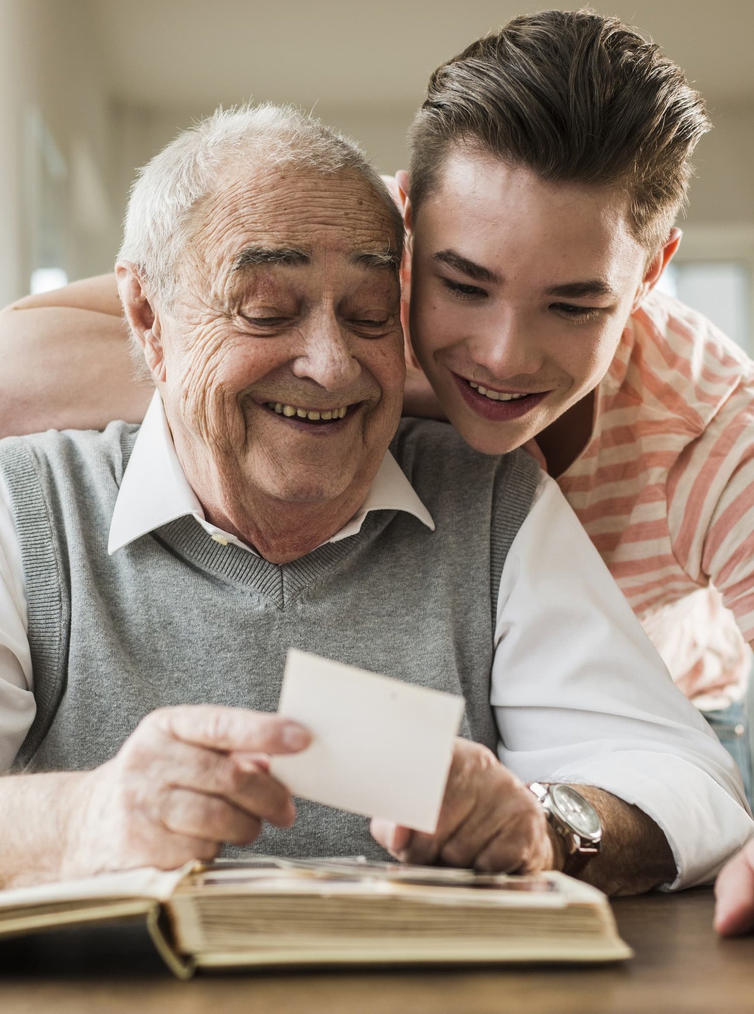 grandfather-and-grandson-watching-old-photographie-2024-09-23-03-25-27-utc